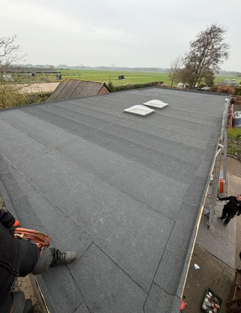 Platdak renovatie in Woerden