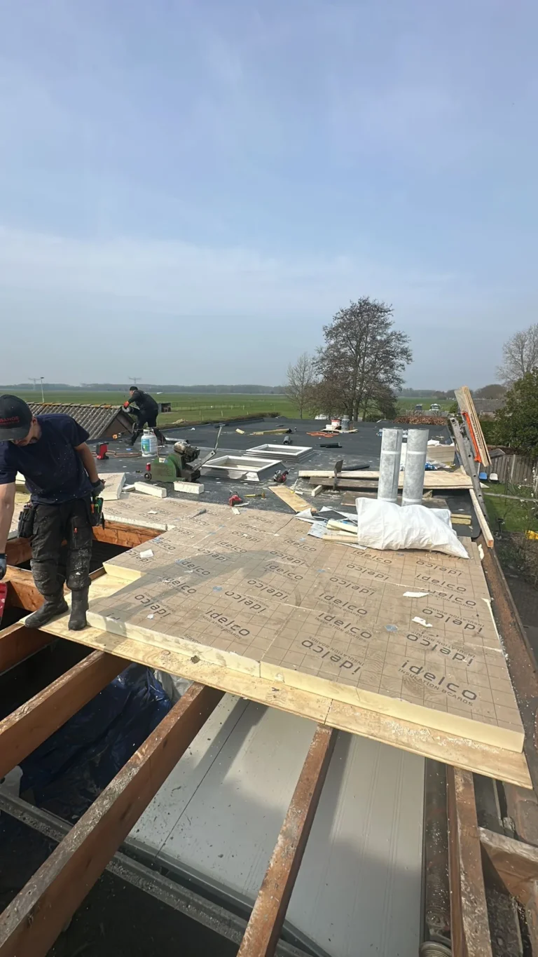 Platdak renovatie in Woerden