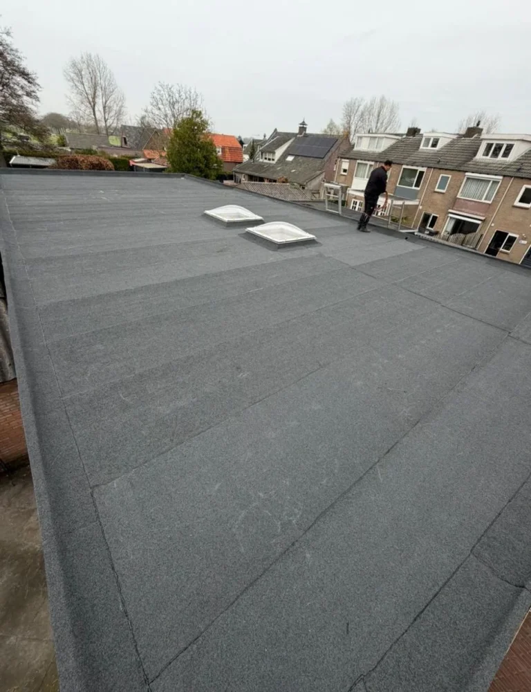 Platdak renovatie in Woerden